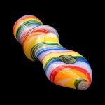 Colorful glass cannabis water pipe on a black background.