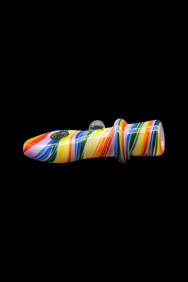 Colorful glass pipe isolated on a black background.