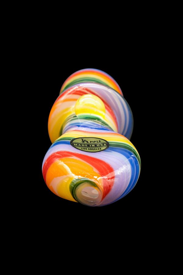 Colorful glass pipe with "JC Pipes - Made in USA" label against a black background.