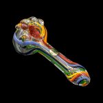 Colorful glass smoking pipe against a black background.