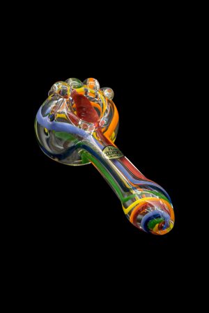 Hand-blown glass pipe with colorful swirls against a black background.