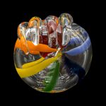 Colorful glass cannabis water pipe against a black background.