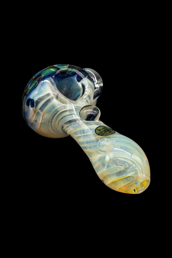 Glass cannabis pipe with swirling blue and cream patterns.
