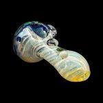 Glass cannabis pipe with swirling blue and yellow patterns on a black background.