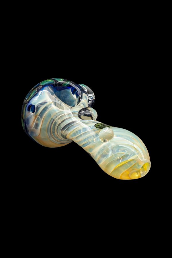 Glass cannabis pipe with swirling blue and yellow patterns on a black background.