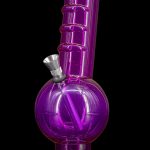 Purple glass water pipe with metallic accents.