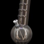 Black glass water pipe, also known as a bong, with a spherical base.