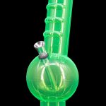 Green glass water pipe (bong) with illuminated neon effect.
