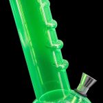 Green glass bong with bubbling water visible inside, against a black background.