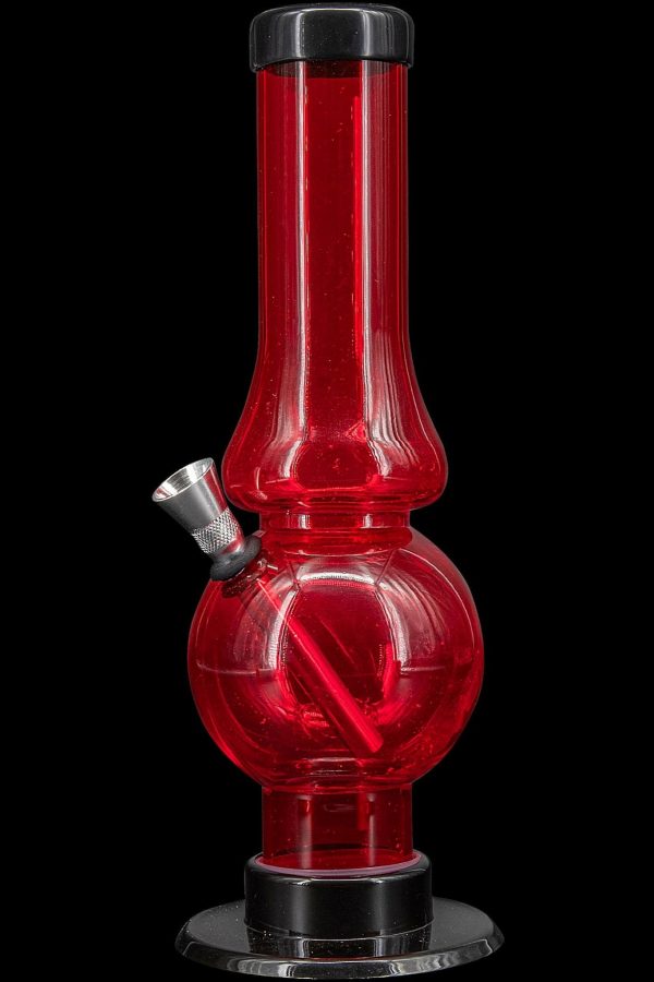 Red glass bubbler water pipe for smoking cannabis.