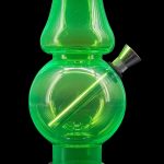 Green glass water pipe (bong) with a removable downstem, isolated on a black surface.