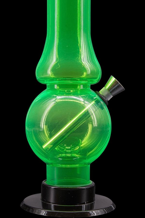 Green glass water pipe (bong) with a removable downstem, isolated on a black surface.