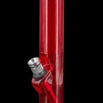 Red glass water pipe with metallic accents, studio shot.