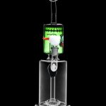 A glass water pipe (bong) decorated with a Frankenstein monster theme, featuring green and black accents, and a bubbler base.