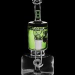 Green glass water pipe (rig) with percolator, isolated on black.
