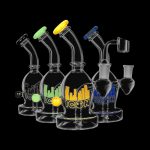 A studio shot of the Diamond Glass Icon Ori Dab Rig, displaying a clear glass rig from a slightly elevated angle against a black backdrop.