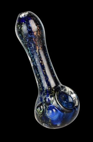 A close-up, angled view of the Dichro Dream Spoon Pipe, showcasing its dichroic glass with a shimmering, colorful effect.