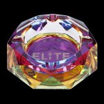 Iridescent glass ashtray with "ELITE" logo and cannabis leaf design.