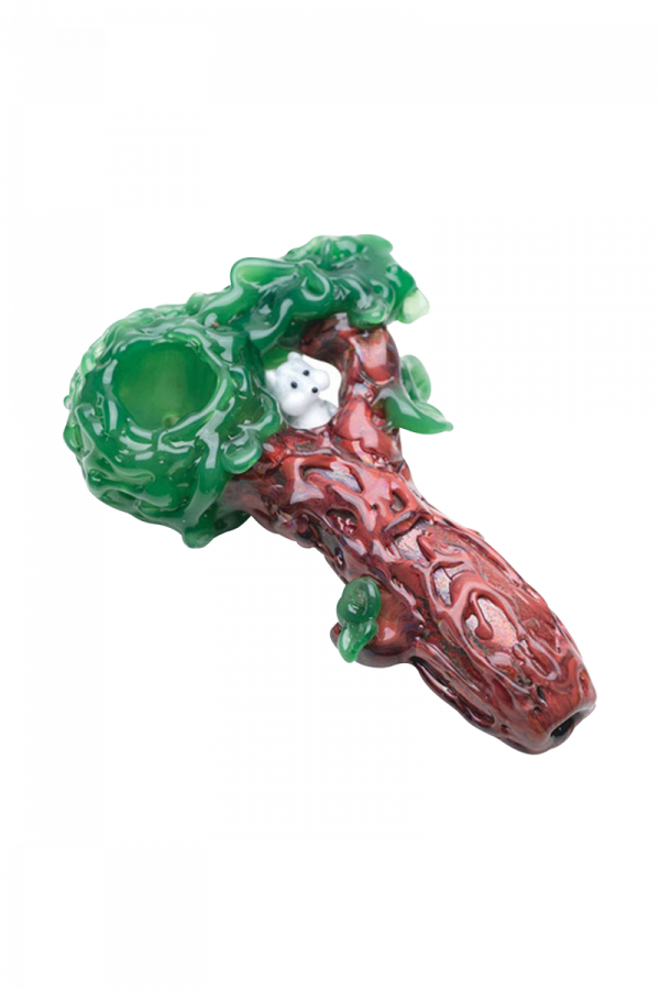 The Empire Glassworks "Squirrels Nest" Spoon Pipe is shown in a close-up, angled view, featuring a textured, green and brown design resembling a nest.