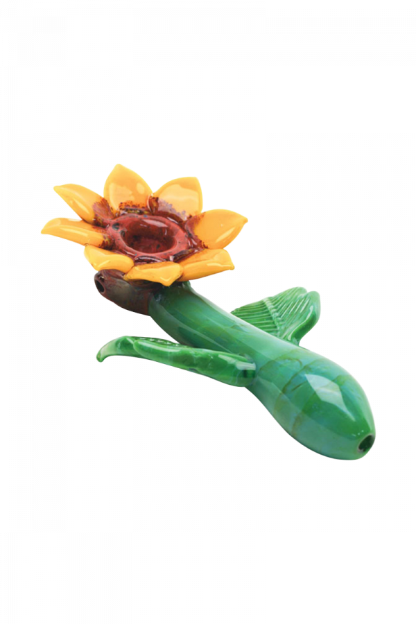 Front view of the Empire Glassworks Sunflower Hand Pipe, showcasing a detailed, yellow flower-shaped bowl on a curved stem.