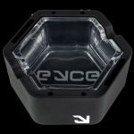 Black cannabis concentrate container with clear interior and branded logo.
