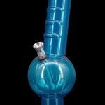 Blue glass water pipe (bong) isolated on a black background.