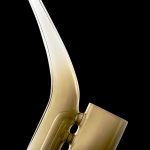 Golden glass oil rig with a curved neck and wide bowl, isolated on a black background.