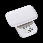 White digital scale displaying 0.00g, used for measuring cannabis.