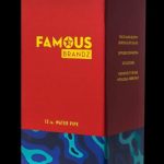 Front view of the Famous Design-Fabric Water Pipe, a red glass piece with a dark joint displayed against a plain background.