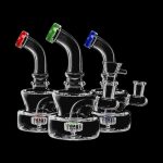 A studio shot displays multiple clear glass Fat Bottom Mini Water Pipes arranged to showcase their compact size and simple design.