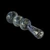 A three-bowl Fermion Skin Triple Bowl Spoon Pipe is displayed in a side view, showcasing its curved shape and textured glass.