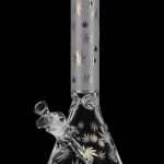 Front view of the Foil Canna-Leaf Print Beaker Bong, displaying a clear glass beaker with a leafy print design.