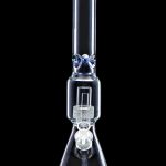 Clear glass water pipe (bong) with intricate percolator and blue accents, isolated on a black background.