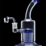 Blue glass dab rig with quartz banger.