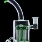 Green glass bubbler water pipe with quartz bangers.