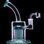 Glass dab rig with multiple diffusion towers, isolated on a black background.