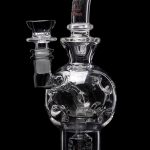 Clear glass water pipe (bong) with intricate bubble design.