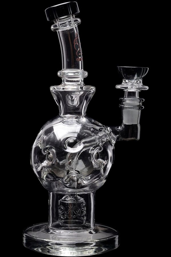 Clear glass water pipe (bubbler) with intricate skull design, isolated on black.