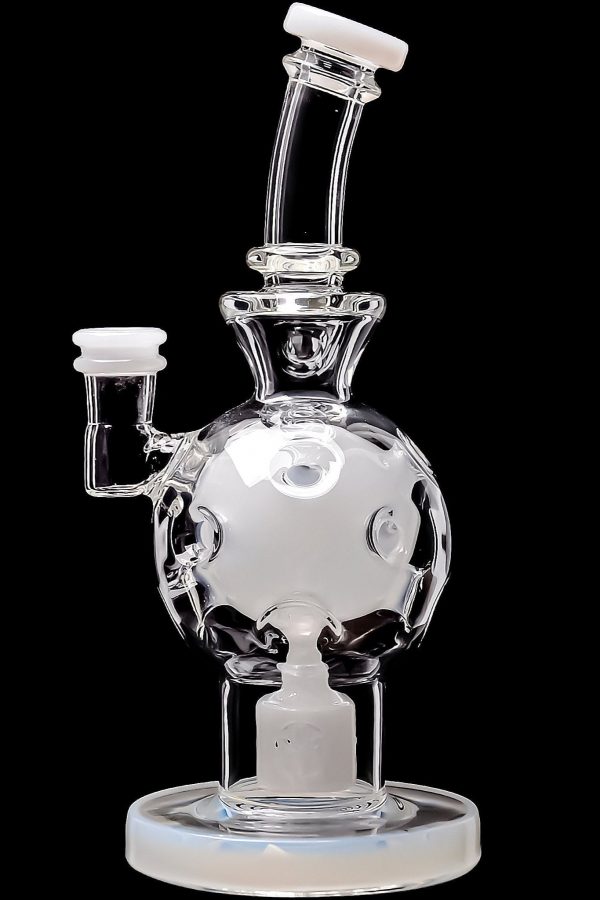 Clear glass water pipe shaped like a skull with a rounded base, isolated on a black background.