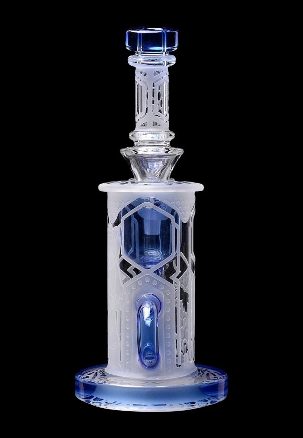 Intricate glass dab rig with blue accents, featuring a geometric, lattice-like design.