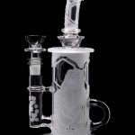 Frosted glass water pipe (bong) with intricate sculpted figures, featuring a separate downstem and bowl.