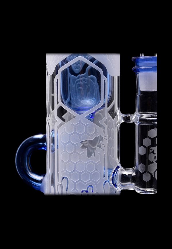 Clear glass water pipe with blue accents, honeycomb pattern, and sculpted bee detail.