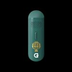 Green cannabis vaporizer with gold detailing and a “G” logo.