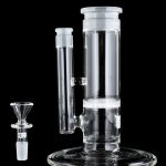 Clear glass bubbler water pipe with a glass bowl next to it on a black background.