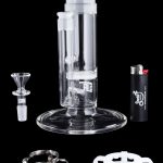 Clear glass water pipe (bong) with detachable downstem, bowl, silicone band, carb cap, and lighter, displayed on a black background.