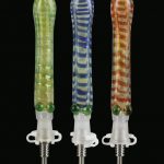 A close-up, angled view of the Glass Dab Collector Straw with 10mm Titanium Tip, showing its clear glass construction.