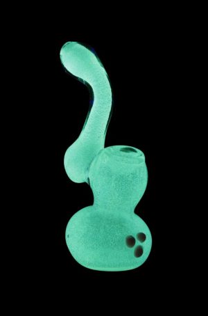 Front view of the Glow in the Dark Glass Bubbler, emitting a bright green glow against a black background.
