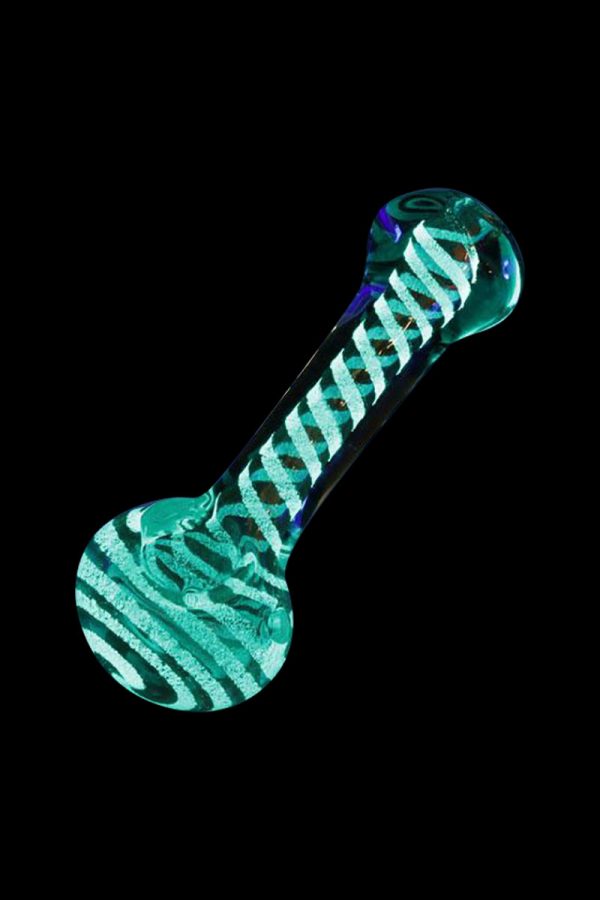 Front view of the Glow in the Dark Swirl Hand Pipe, featuring a swirling, translucent green glass design against a black background.