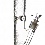 Front view of the Glow in the Dark Tree Water Pipe, a tall glass tube with etched tree branch designs.