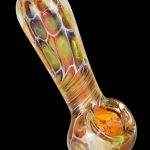 A close-up, angled view of the Golden Sea Turtle Shell Design Spoon Pipe, showcasing its sculpted, patterned glass body.